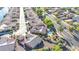Aerial view of a home with a backyard putting green, pool, and solar panels on the roof at 42318 W Abbey Rd, Maricopa, AZ 85138