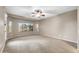 Expansive bedroom with large windows offering views of the landscape at 42318 W Abbey Rd, Maricopa, AZ 85138