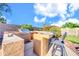 Outdoor kitchen with a built-in BBQ, bar seating, and plenty of counter space for entertaining at 42318 W Abbey Rd, Maricopa, AZ 85138