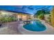 Beautiful backyard with a pool, spa, and plenty of space for entertaining at 42318 W Abbey Rd, Maricopa, AZ 85138