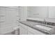 Modern bathroom features granite counters, white cabinets, and a shower-tub combination at 5106 E Midnight Star Dr, San Tan Valley, AZ 85143