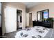 Cozy bedroom featuring a closet and dresser, complete with neutral tones and ample natural light at 5106 E Midnight Star Dr, San Tan Valley, AZ 85143