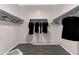 Walk-in closet with installed shelf and rod system for organized storage and clothing display at 5106 E Midnight Star Dr, San Tan Valley, AZ 85143