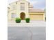 Charming two-story home with a two car garage and well-manicured front yard at 7136 N 73Rd Dr, Glendale, AZ 85303