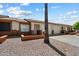 Charming single-story home featuring a two-car garage and low-maintenance desert landscaping for a clean, inviting curb appeal at 8020 E Keats Ave # 285, Mesa, AZ 85209