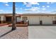 Charming single-story home featuring a two-car garage and low-maintenance desert landscaping for a clean, inviting curb appeal at 8020 E Keats Ave # 285, Mesa, AZ 85209