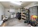 Organized garage space with ample storage and a clean washer and dryer at 8020 E Keats Ave # 285, Mesa, AZ 85209