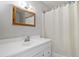 Bathroom with new vanity, sink, mirror, and bathtub with shower at 946 S Pomeroy Cir, Mesa, AZ 85210