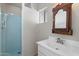 Bathroom featuring a new vanity, sink, and shower with vintage tiles at 946 S Pomeroy Cir, Mesa, AZ 85210