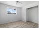 Bedroom with new vinyl floors, closet, and bright window at 946 S Pomeroy Cir, Mesa, AZ 85210