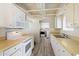 Functional kitchen featuring white cabinetry, modern appliances, and durable countertops for everyday cooking needs at 946 S Pomeroy Cir, Mesa, AZ 85210
