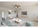 Bright living room featuring modern furniture and decor, creating a comfortable and stylish space at 946 S Pomeroy Cir, Mesa, AZ 85210