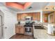 Well-equipped kitchen featuring stainless steel appliances and granite countertops at 10030 W Indian School Rd # 221, Phoenix, AZ 85037