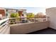 Balcony view of the community, featuring garages, and landscaping at 1056 N Miller Rd, Tempe, AZ 85288