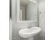 Chic half-bathroom features a classic pedestal sink and modern fixtures at 1056 N Miller Rd, Tempe, AZ 85288