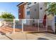 Community pool with gated fence, lounge seating and community rules at 1056 N Miller Rd, Tempe, AZ 85288