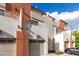 Beautiful view of a condo building with private balconies and garages at 1056 N Miller Rd, Tempe, AZ 85288