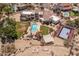 Overhead view of the estate highlights its outdoor amenities, including a pool, spa, and basketball court at 11809 S Montezuma Ct, Phoenix, AZ 85044