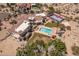 Aerial view featuring the house, pool, spa, and basketball court at 11809 S Montezuma Ct, Phoenix, AZ 85044