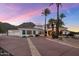 Elegant desert home with long driveway and well-maintained landscaping at 11809 S Montezuma Ct, Phoenix, AZ 85044