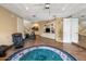 Large fitness space featuring a mirrored wall, a treadmill, and easy access to the bathroom at 11809 S Montezuma Ct, Phoenix, AZ 85044