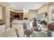 Large living room with fireplace, built-in shelves and view to the dining area at 11809 S Montezuma Ct, Phoenix, AZ 85044