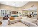 Open-concept living space with high ceilings, and seamless flow to the kitchen and outdoor areas at 11809 S Montezuma Ct, Phoenix, AZ 85044