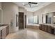 Large bathroom with double vanities, jacuzzi tub, and walk-in shower at 12006 E Yucca St, Scottsdale, AZ 85259