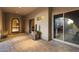 Private courtyard featuring a decorative water fountain and brick flooring at 12006 E Yucca St, Scottsdale, AZ 85259