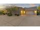 Charming single story home featuring a spacious driveway and a two-car garage at 12006 E Yucca St, Scottsdale, AZ 85259