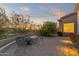 Cozy outdoor patio featuring a fire pit, ample seating and views at 12006 E Yucca St, Scottsdale, AZ 85259