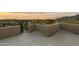 Neutral patio boasting an iron gate and scenic views at 12006 E Yucca St, Scottsdale, AZ 85259