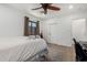 Cozy bedroom with a ceiling fan, and a view from the window at 1246 E Cambridge Ave, Phoenix, AZ 85006