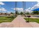 Sidewalk in the community park, with grassy lawns and recreational amenities at 137 W Del Rio St, Gilbert, AZ 85233