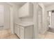 Hallway features ample storage space with nearby access to a full bathroom and bedrooms at 137 W Del Rio St, Gilbert, AZ 85233