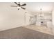 Spacious living room and kitchen area with modern appliances and abundant natural light at 137 W Del Rio St, Gilbert, AZ 85233