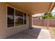 Covered patio area with views of backyard and fence, providing outdoor living space at 137 W Del Rio St, Gilbert, AZ 85233