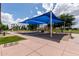 Community playground with shade structure, slides and play equipment at 137 W Del Rio St, Gilbert, AZ 85233