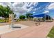 Bright playground with modern equipment under a sunny blue sky at 137 W Del Rio St, Gilbert, AZ 85233