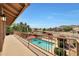 Spacious balcony overlooking a sparkling pool and beautiful neighborhood landscape at 14034 S 34Th Pl, Phoenix, AZ 85044