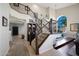 Grand foyer with staircase, iron railings, soaring ceilings, and large windows with beautiful natural light at 14034 S 34Th Pl, Phoenix, AZ 85044