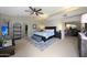 Comfortable main bedroom featuring a king-size bed and stylish decor at 14034 S 34Th Pl, Phoenix, AZ 85044