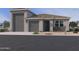 Charming single-story home with a three car garage, neutral color palette and desert landscaping at 15785 W Cheryl Dr, Waddell, AZ 85355