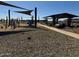 Community playground featuring a shaded picnic area for relaxing and playing at 15785 W Cheryl Dr, Waddell, AZ 85355