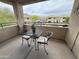 Relaxing balcony view with outdoor seating, perfect for enjoying scenic neighborhood views at 16013 S Desert Foothills Pkwy # 2056, Phoenix, AZ 85048