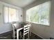 Bright dining area with a window and a table set for four, offering a cozy atmosphere at 16013 S Desert Foothills Pkwy # 2056, Phoenix, AZ 85048