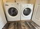 Convenient laundry area with a modern, front-loading washer and dryer set, maximizing space and efficiency at 16013 S Desert Foothills Pkwy # 2056, Phoenix, AZ 85048
