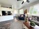 Spacious living room featuring an open layout connecting the kitchen and dining area with plenty of natural light at 16013 S Desert Foothills Pkwy # 2056, Phoenix, AZ 85048