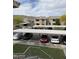 Covered parking area with assigned spaces for residents, offering protection from the elements and convenient access at 16013 S Desert Foothills Pkwy # 2056, Phoenix, AZ 85048