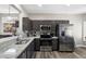 Well-equipped kitchen featuring stainless steel appliances, granite countertops, and ample cabinetry at 16246 W Talara Way, Surprise, AZ 85374
